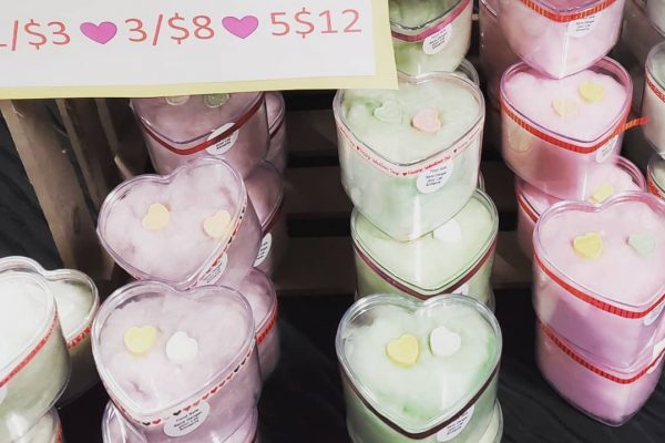 Colorful cotton candy in heart-shaped packaging